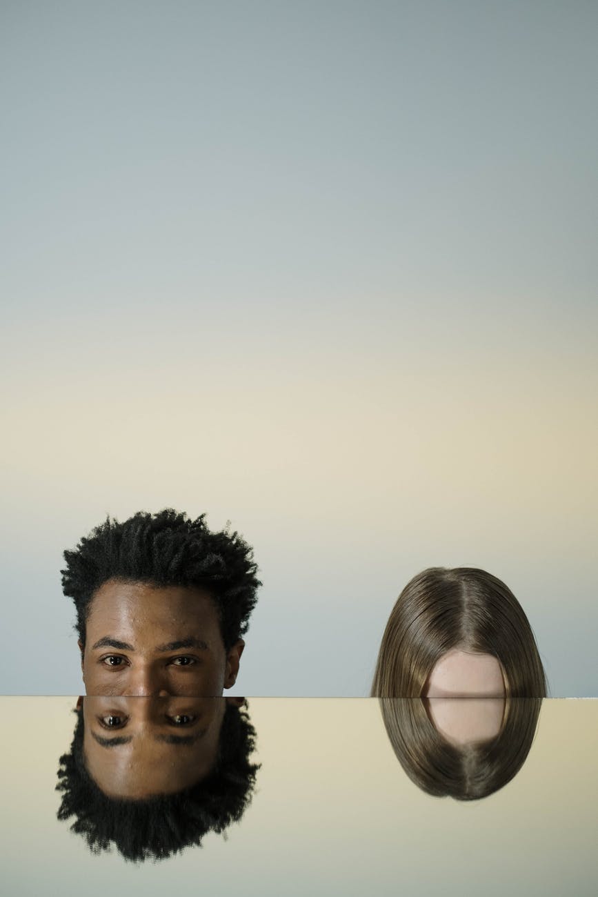 man and woman standing side by side